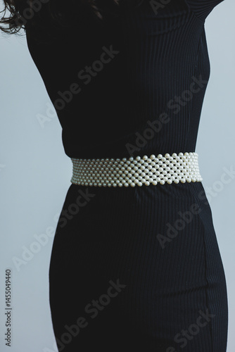 Obraz na płótnie Exquisite pearl belt for an elegant look. Women's pearl belt. Stylish women's accessories. w salonie