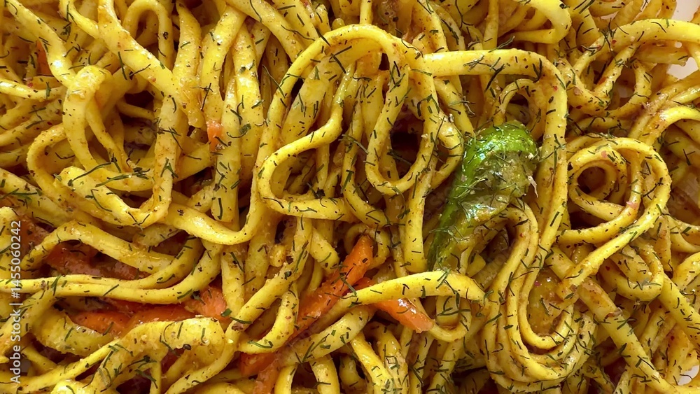Enjoy a bowl of delicious and flavorful StirFried Noodles enhanced with fresh Herbs and Spices Enjoy a bowl of delicious and flavorful StirFried Noodles enhanced with fresh Herbs and Spices