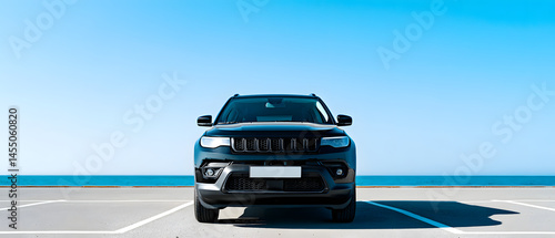 Single car in a parking lot. Contrast day light, wide banner with copy space.