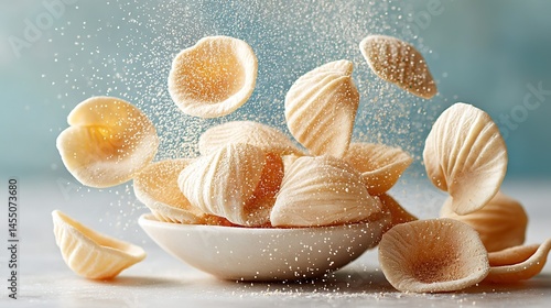   A close-up of a bowl of sugar-topped food with bananas in the background
