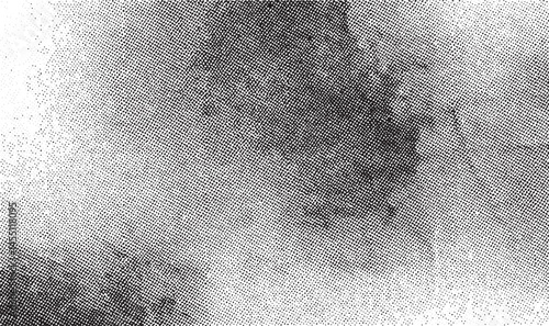 A textured grayscale abstract formation dominates the frame with subtle tonal variations.