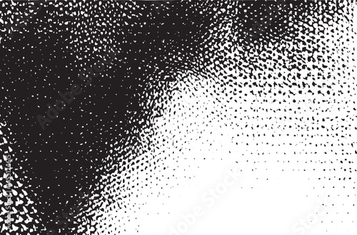 A fragmented black and white displays a transition between darkness and light creating an abstract texture.