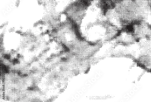 A close-up view of a grayscale face with textured dots conveying a sense of introspection.