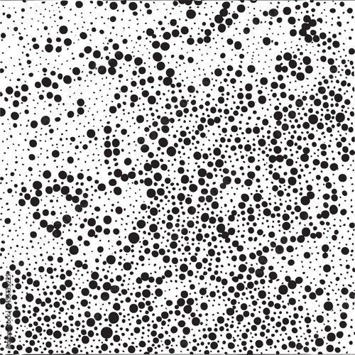 A vast dense field of uniformly sized black circles scattered across a white background.