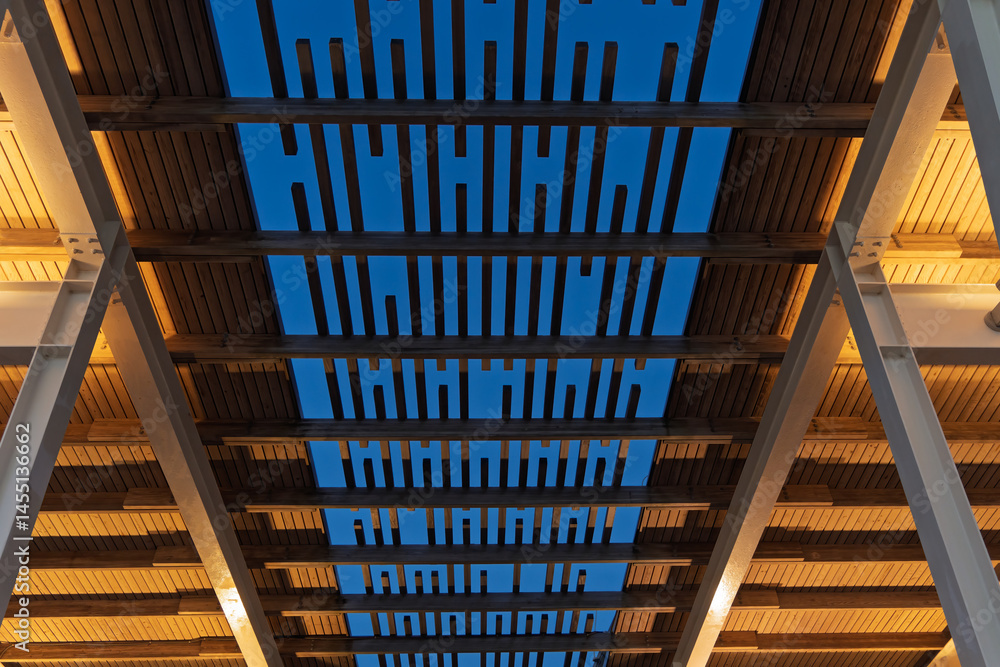 Looking up at a sun shelter with deep blue sky just after sunset. Architectural design concept graphic resource Looking up at a sun shelter with deep blue sky just after sunset. Architectural design concept graphic resource