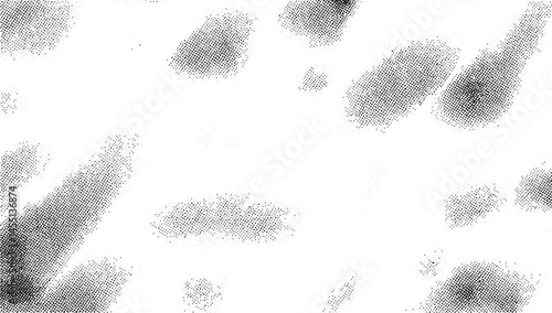 A collection of scattered dark ink blots floats across a white background.