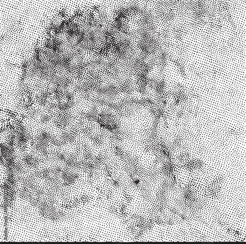A grayscale portrait of a person’s face reveals intricate textures and subtle shading.