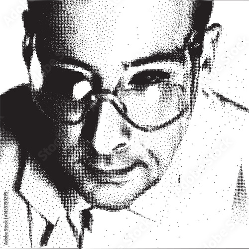 A mature man peers intently through thick-rimmed eyeglasses.