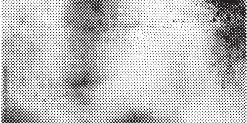 A grayscale portrait reveals a blurred textured face with scattered dots.