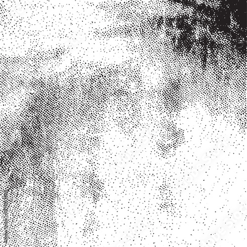 A grayscale portrait focuses on a textured face with subtle tonal variations.