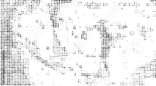 A grayscale portrait reveals a blurred face amidst a dense of small dots.