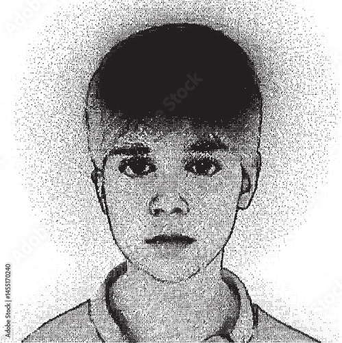 A young boy gazes directly at the viewer with a contemplative expression.