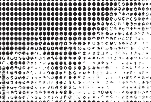 A dense array of small white dots against a black background creates an abstract .