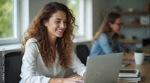 young businesswoman working on laptop