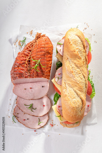 Homemade and fresh sandwich with ham, cheese and chive.