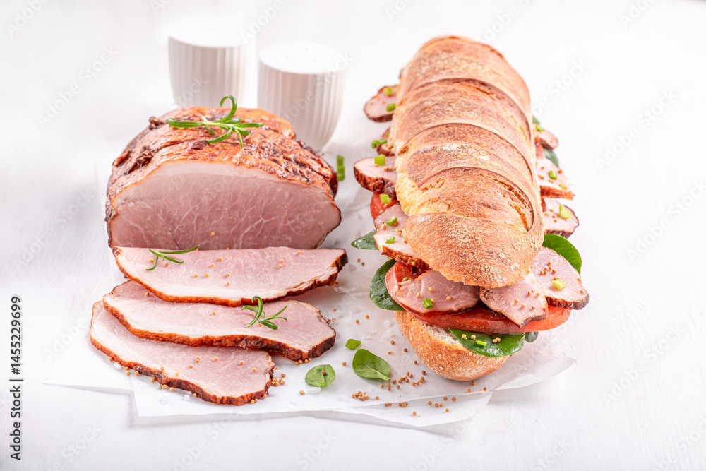 Healthy and fresh sandwich with ham, tomato and lettuce.