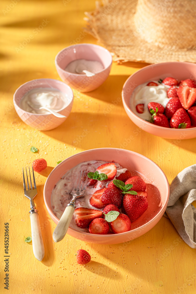 Creamy and delicious strawberries as summer fresh dessert.