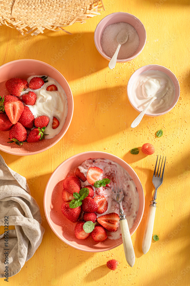 Tasty and homemade strawberries as simple summer snack.