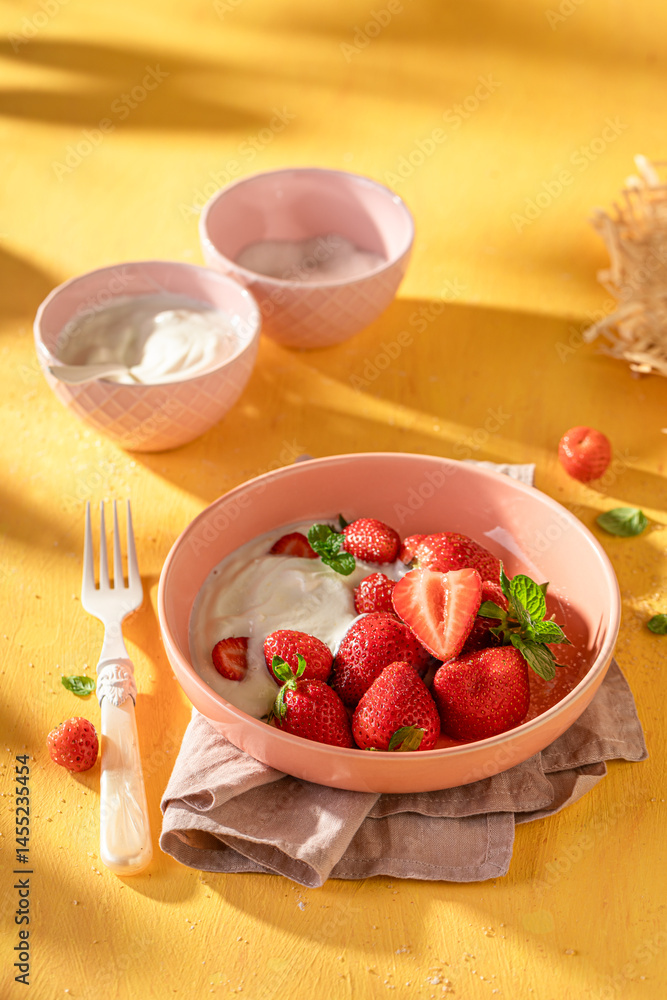 Creamy and delicious strawberries as simple summer snack.