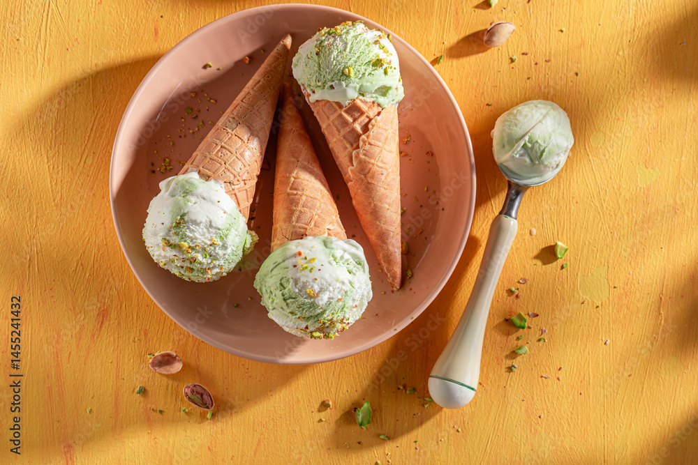 Fresh and tasty pistachio ice cream made of green nuts.