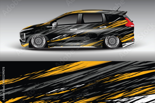 Stylish black car with yellow stripes on a gradient background
