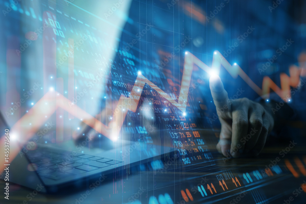 Businessman analyzing investment charts and financial data during periods of high market volatility to make informed decisions