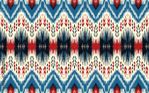 Ikat geometric ornament with diamonds. Ikkat. Seamless pattern. Aztec style. Tribal ethnic vector texture. Folk embroidery, Indian, Scandinavian, Gypsy, Mexican, African rug, wallpaper.