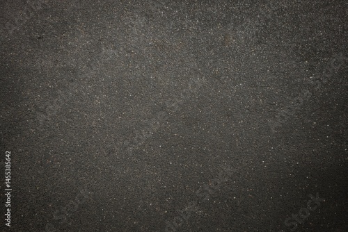 Subtle pattern texture grainy noise effect on dark gray wallpaper background