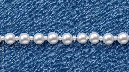 Elegant Pearl Necklace on Denim: A Classic Fashion Statement