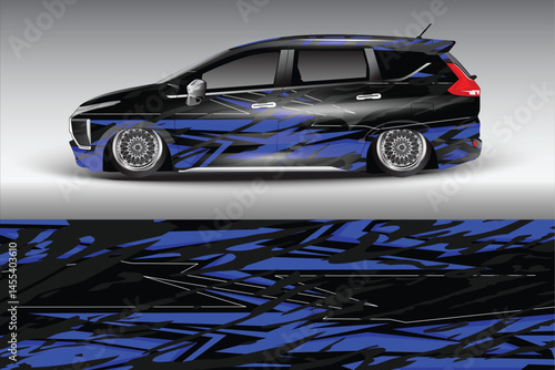 Stylish modified car with dynamic blue graphics design