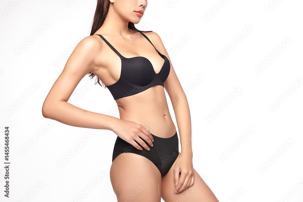 Obraz premium Confident beautiful young asian woman posing in black lingerie on white background, Perfect body,