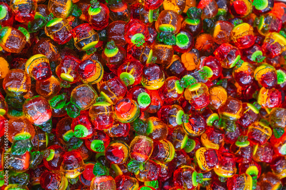 Fototapeta premium Background of assorted colorful marmalade candies. View from above. Jelly candies
