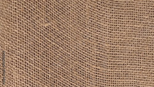 Sackcloth textured background. Jute pattern, rough burlap texture, canvas coarse cloth, brown woven rustic bagging. Natural hessian beige textile texture.  