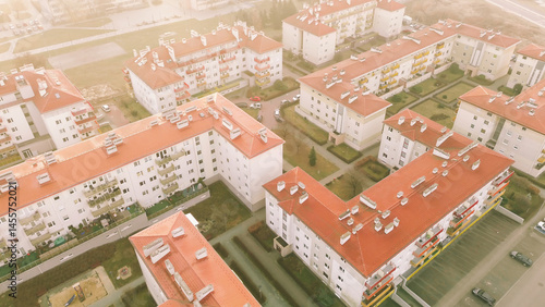 Low-rise apartment complex with red rooftops