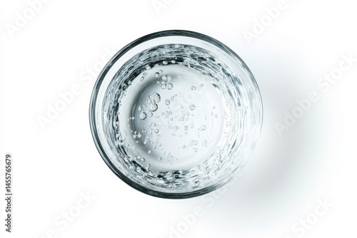 Refreshing sparkling water in glass clear bubbles texture cool pure drink clean fizzy white liquid