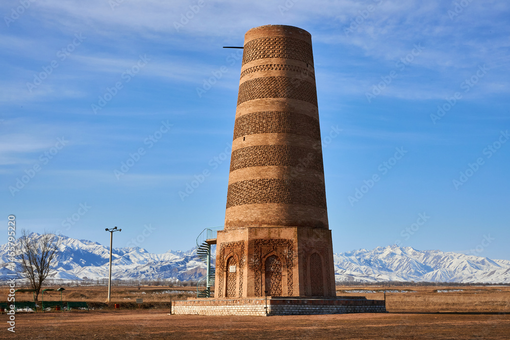 Burana Tower, minaret of the 9th-11th centuries of the Karakhanid state. Touristic place, Kyrgyzstan travel landmark. Ruins of Buranin settlement, ancient city Balasagun Burana Tower, minaret of the 9th-11th centuries of the Karakhanid state. Touristic place, Kyrgyzstan travel landmark. Ruins of Buranin settlement, ancient city Balasagun