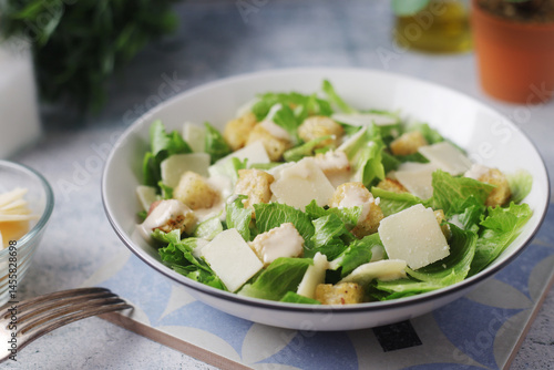A bowl with classic Caesar salad