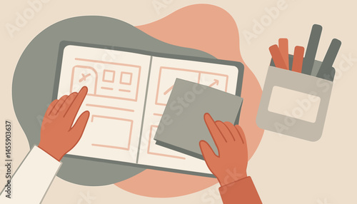 hands collaborating on design project with tablet and papers