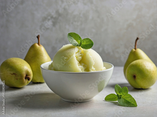 Scoops of pear sorbet in a simple white bowl
