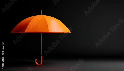 Obraz na płótnie Floating orange umbrella on a deep black backdrop symbolizes modern shelter, safety, and sleek design in a striking product presentation. w salonie