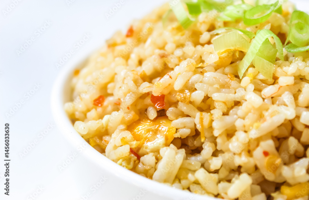 close up of a bowl of fried rice isolated on white background close up of a bowl of fried rice isolated on white background