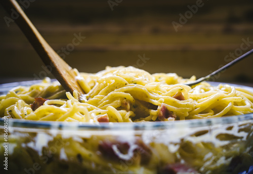Close-up of Creamy Spaghetti Carbonara with Bacon and Herbs 