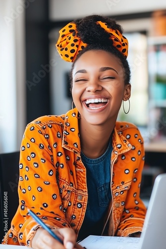 Smiling african female teen wearing orange polka dot headband and jacket