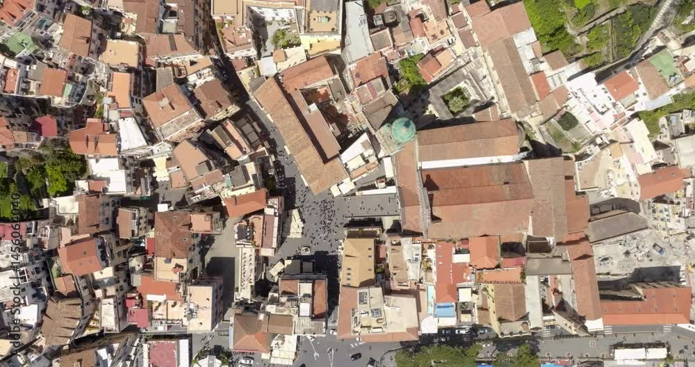 Aerial perpendicular view of the historic center of Amalfi, in the province of Salerno, in Campania, Italy. Among the alleys there are the Cathedral and the main square of the town. Aerial perpendicular view of the historic center of Amalfi, in the province of Salerno, in Campania, Italy. Among the alleys there are the Cathedral and the main square of the town.