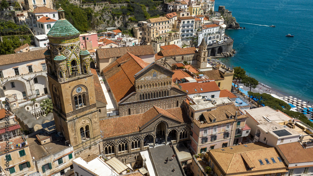 Aerial view of the Amalfi Cathedral, in the province of Salerno, in Campania, Italy. The church, dedicated to St. Andrew the Apostle, is located in the center of the town and near the Tyrrhenian Sea.