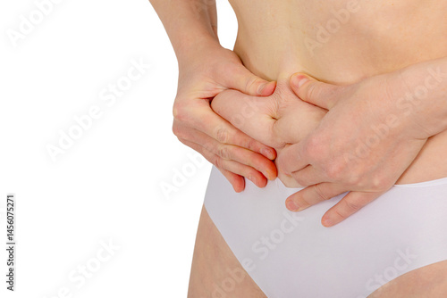 Wallpaper Mural Woman showing excess skin on belly with hands, excess fat, weight loss, abdominoplasty, close-up Torontodigital.ca