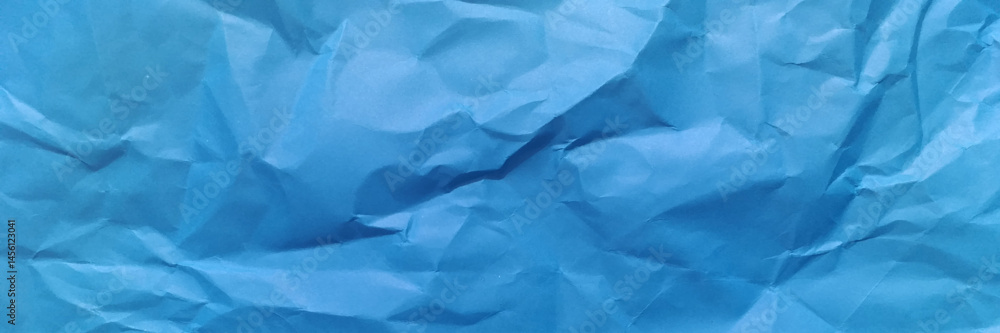 Obraz premium Panorama view Paper texture background, Crumpled paper. blue creased paper.