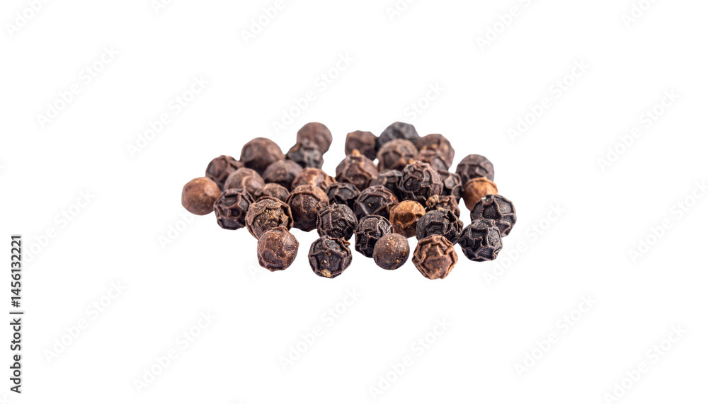 Obraz premium Black peppercorns are popular spice known for their bold flavor and aroma. These dried berries are often used in cooking to enhance dishes, adding touch of heat and complexity