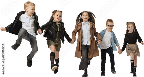 Happy school and preschool age children, girls and boys running, jumping isolated on transparent background. Beauty, kids fashion, ad, education, happy childhood concept.