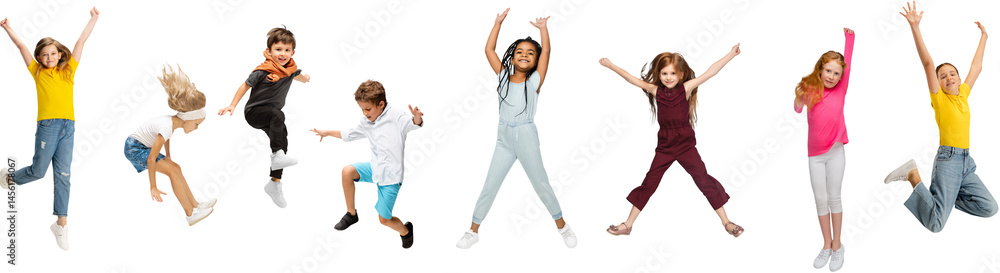 Group of kids in casual clothing jumping with expressive faces, showing joy isolated on transparent background. Concept of childhood, fun, leisure, friendship, early development. Banner
